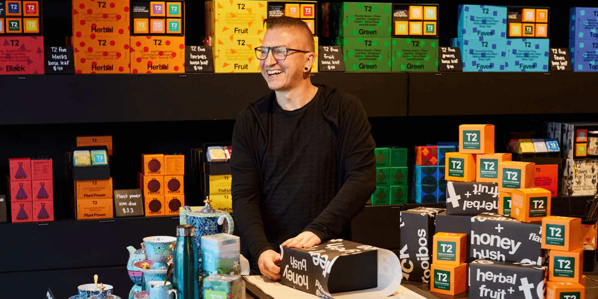 Close up detail of T2 tea on a wooden shelf