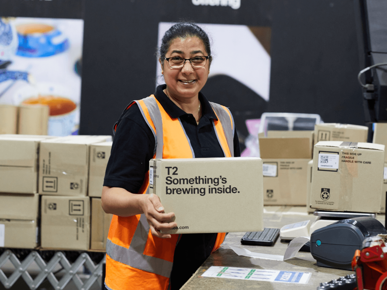 Close up detail of T2 tea on a wooden shelf