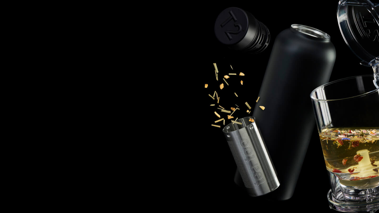 Various T2 steel flasks on a table