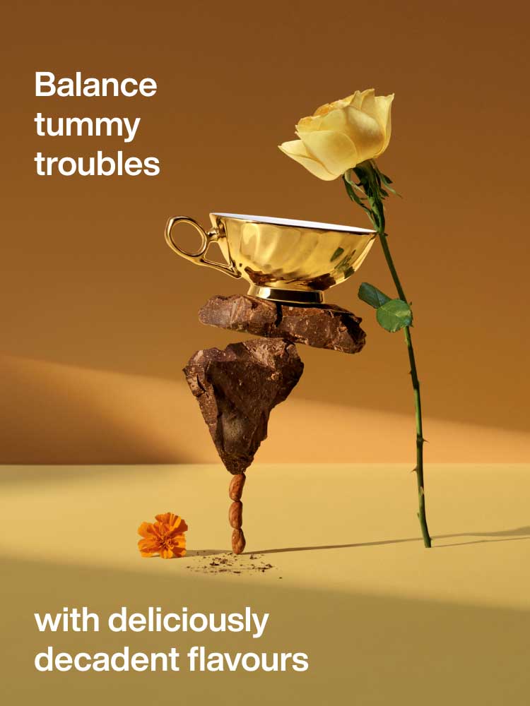 A precariously balanced tower of tummy tea ingredients