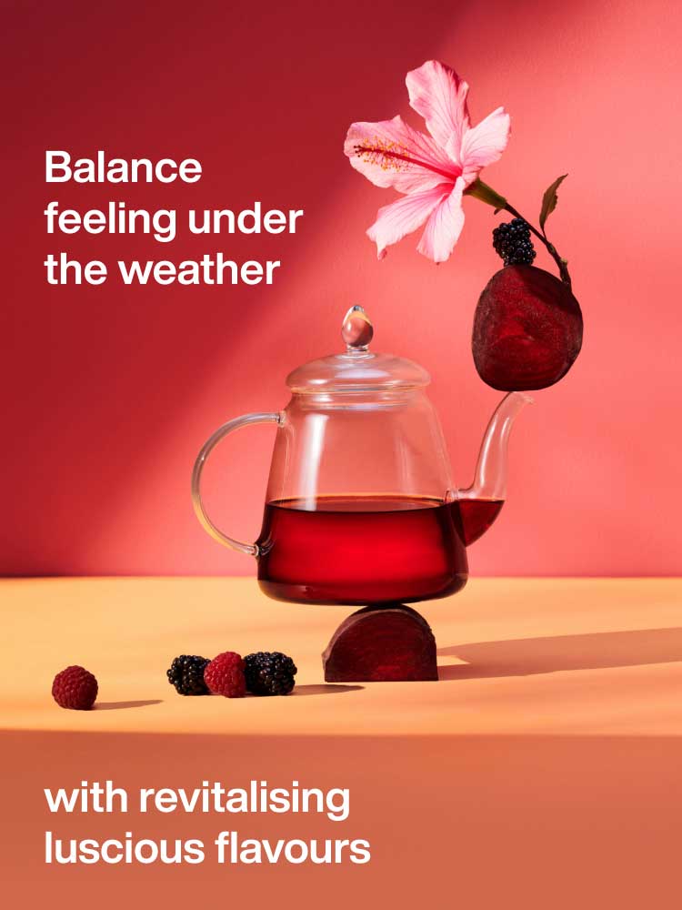 A tea pot balanced on sliced beetroot