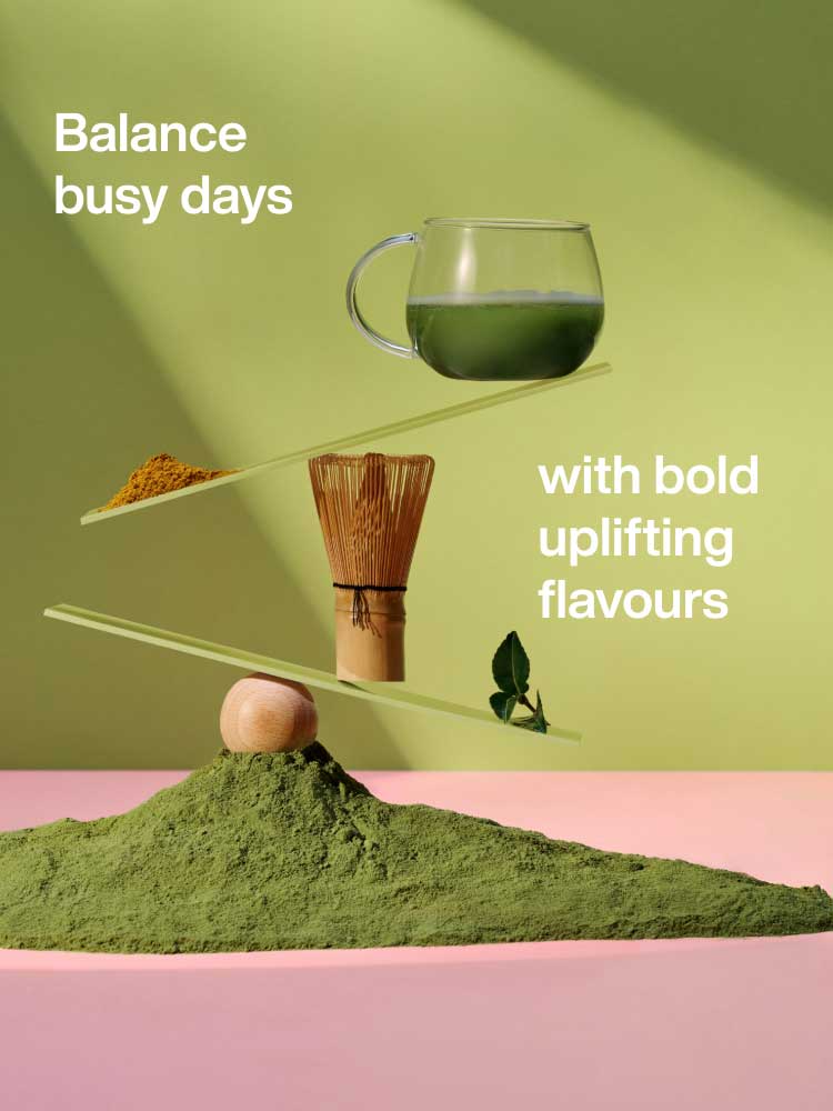 A precariously balanced tower of Matcha tea and matcha accessories