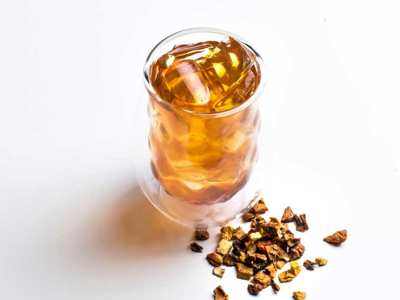 A cup and of Packs A Peach tea