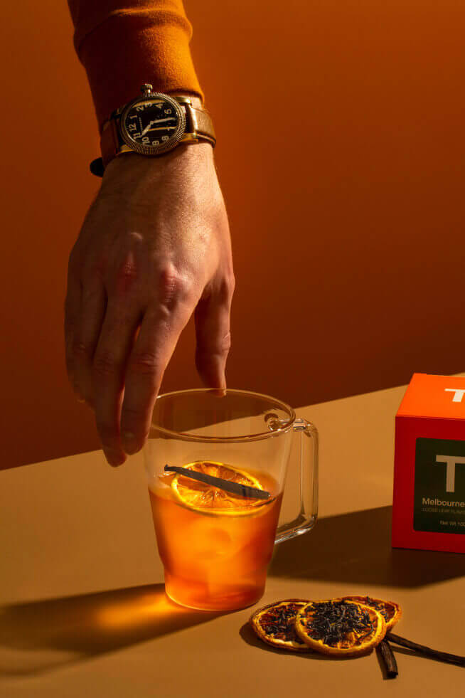 Cup of tea with dried orange slices in