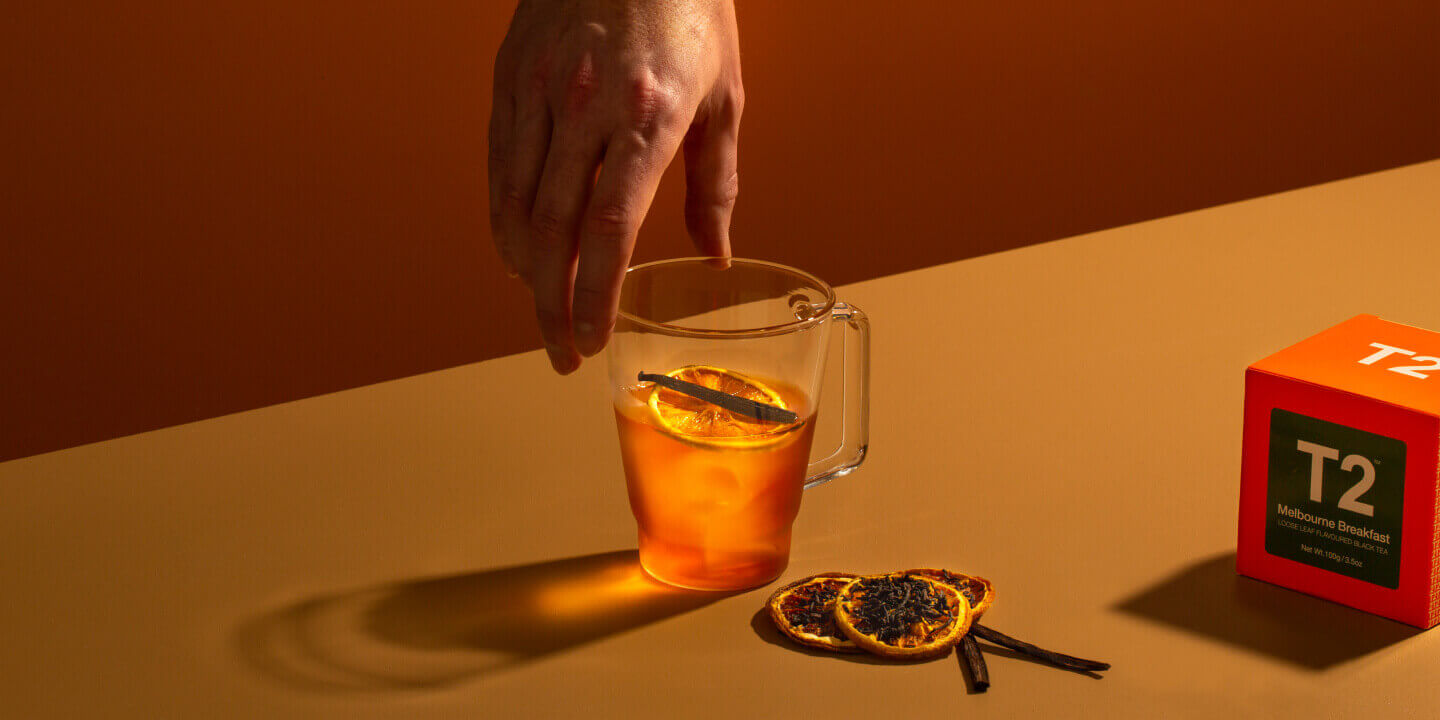 Cup of tea with dried orange slices in