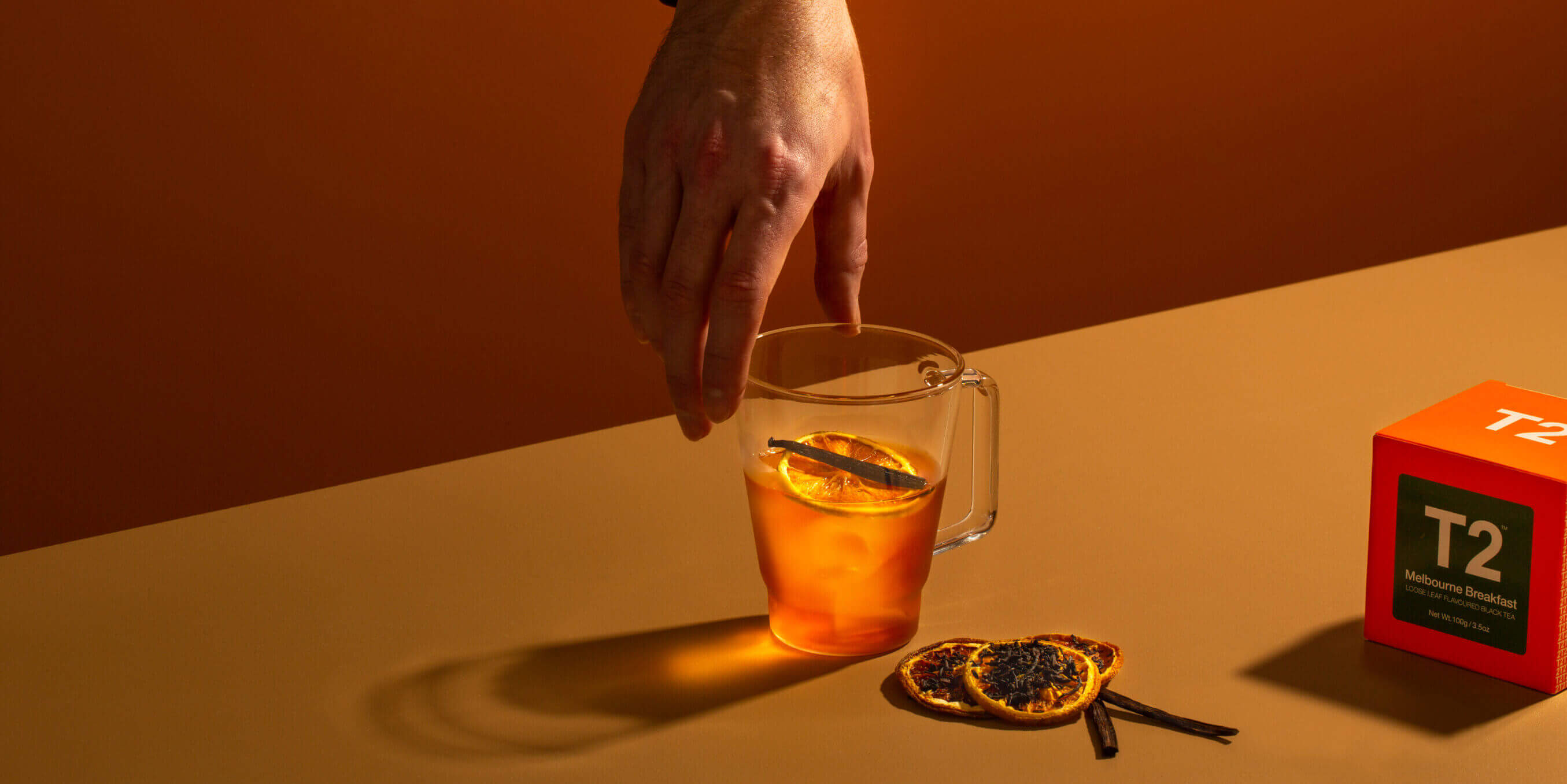 Cup of tea with dried orange slices in