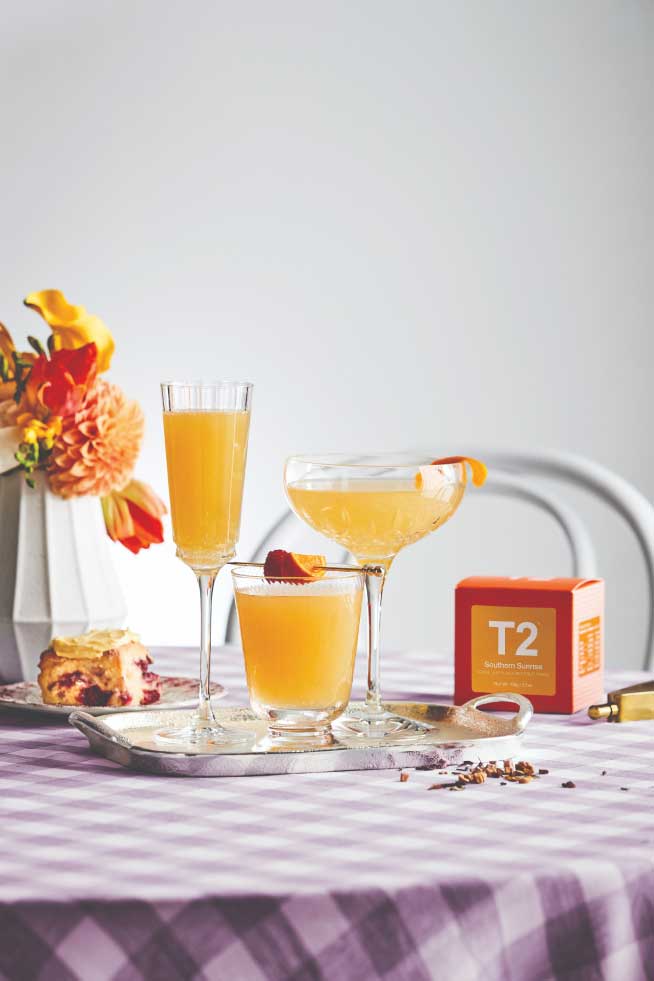 Various full glasses of the Southern Sunrise Mimosa