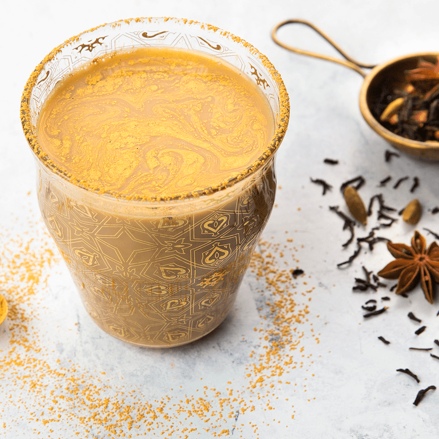 Liquid gold chai in a glass